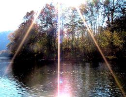 Sunburst Over River